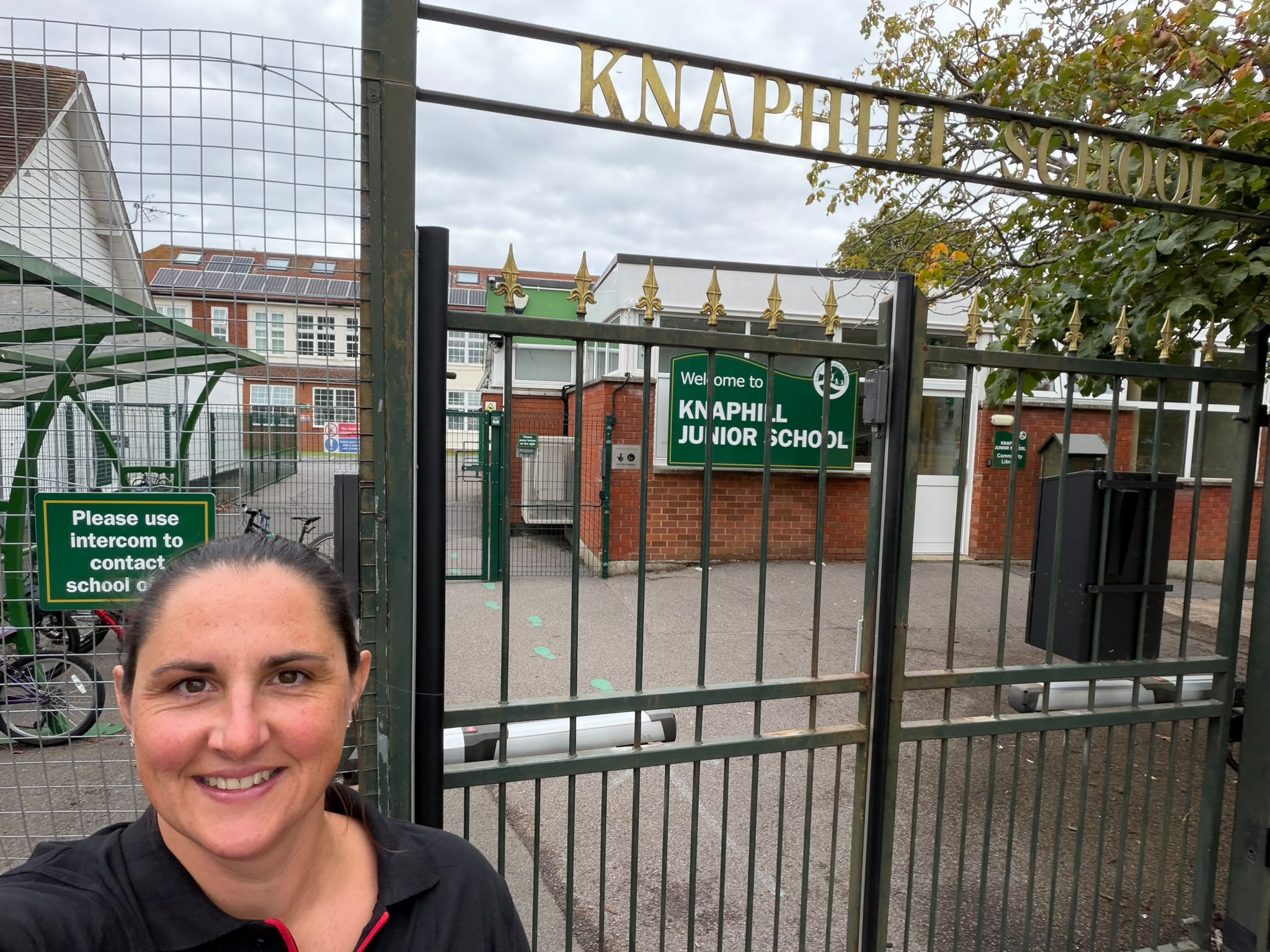 Samantha Skillcorn at the entrance to Knaphill Junior School