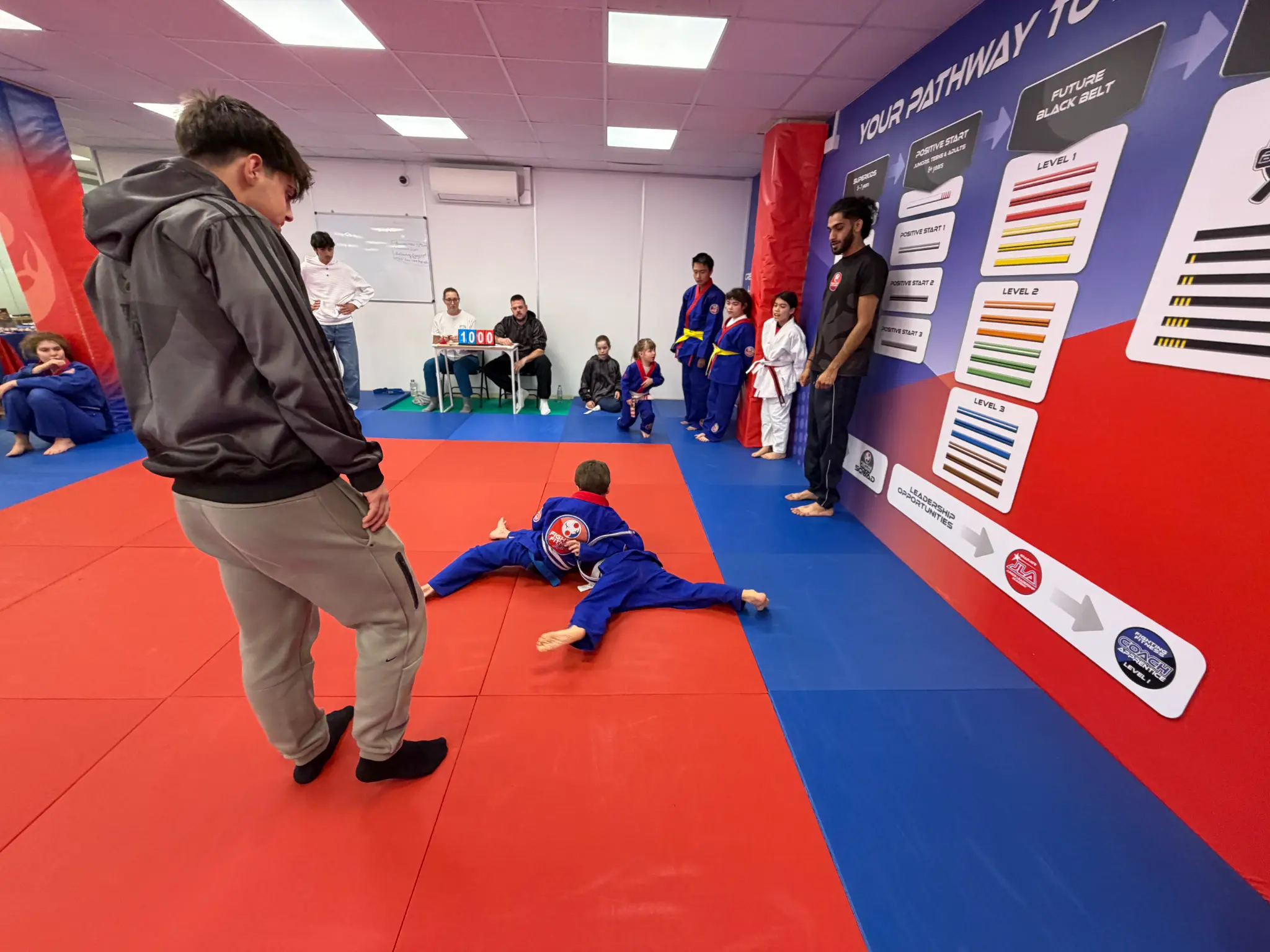 A young judoka making a safe breakfall during the Team Festival