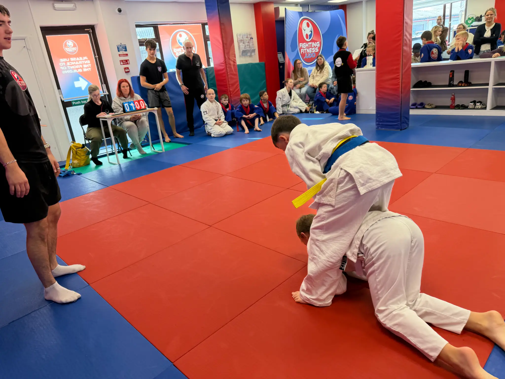 Young judoka practising a controlled throw during the Team Festival