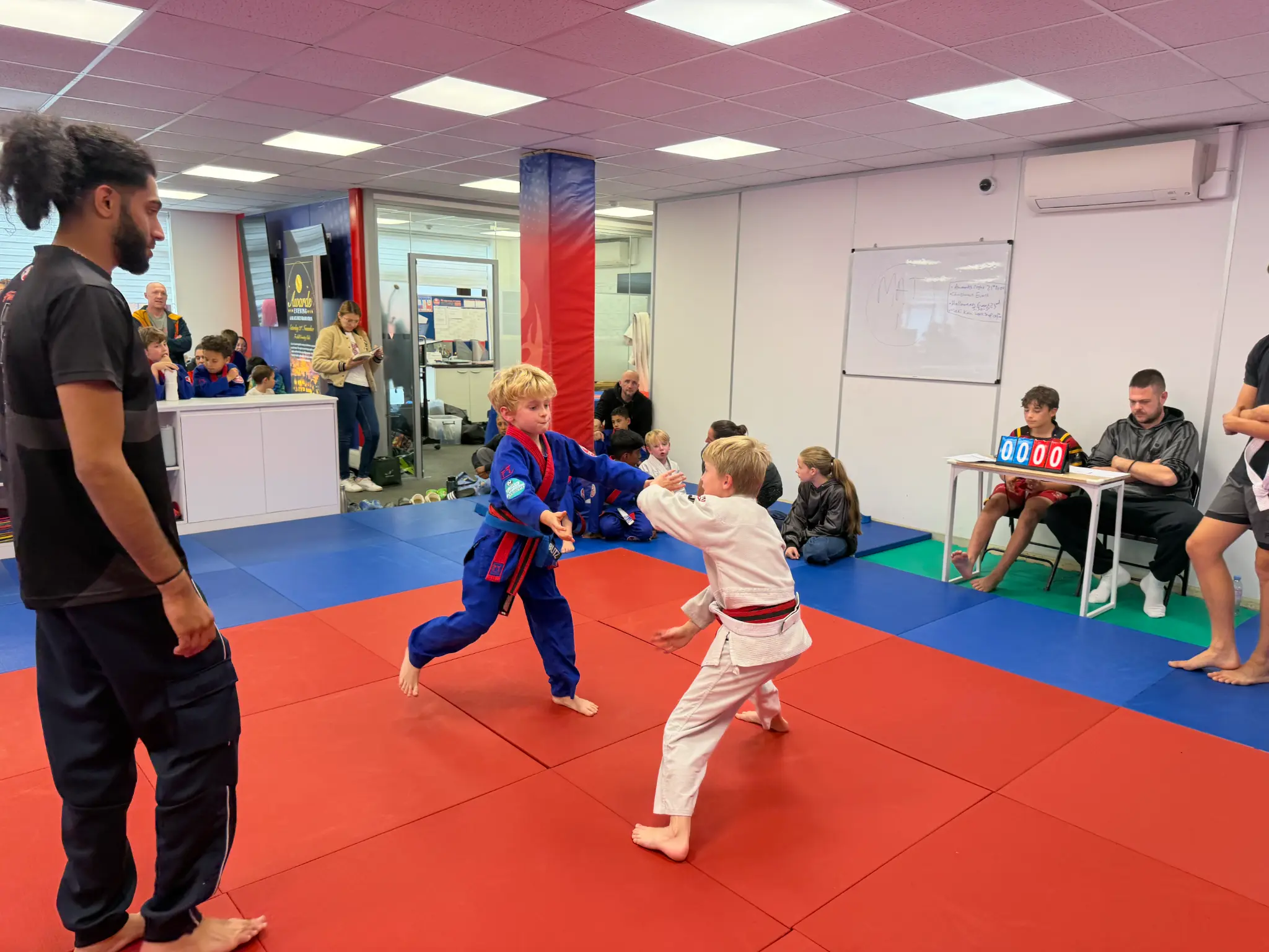 Two young judoka competing during a Team Festival battle